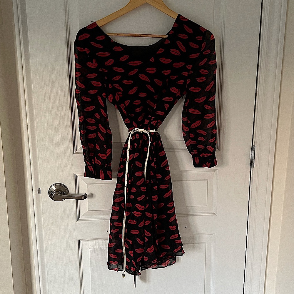 Never worn. High quality silk dress, very cute and elegant.